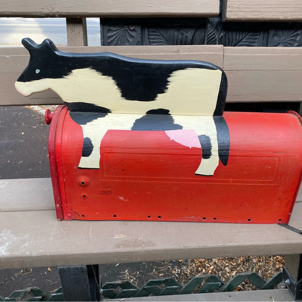 LAST CHANCE. Metal mailbox.  Painted cow.